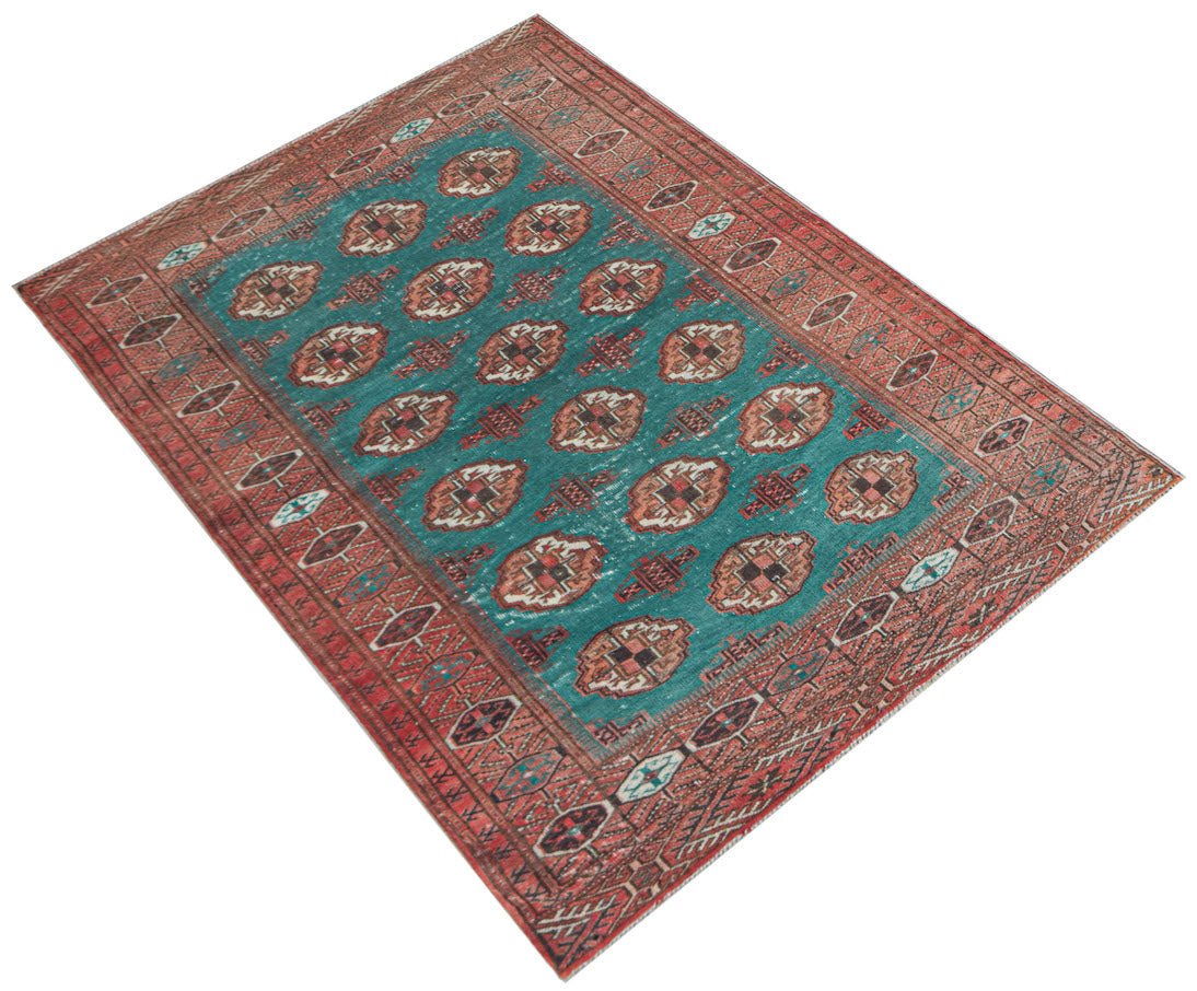 A vintage handwoven Afghan Turkmen rug featuring a teal field with repeating geometric motifs.