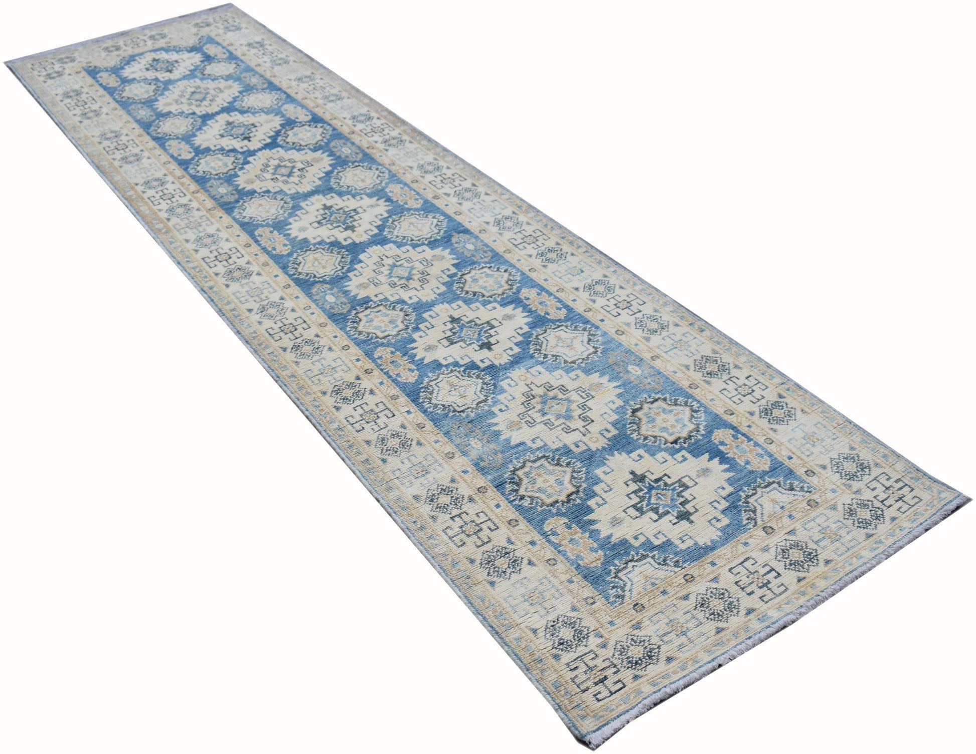 A handmade Afghan Kazakh runner rug featuring a geometric pattern in shades of blue, beige, and grey.