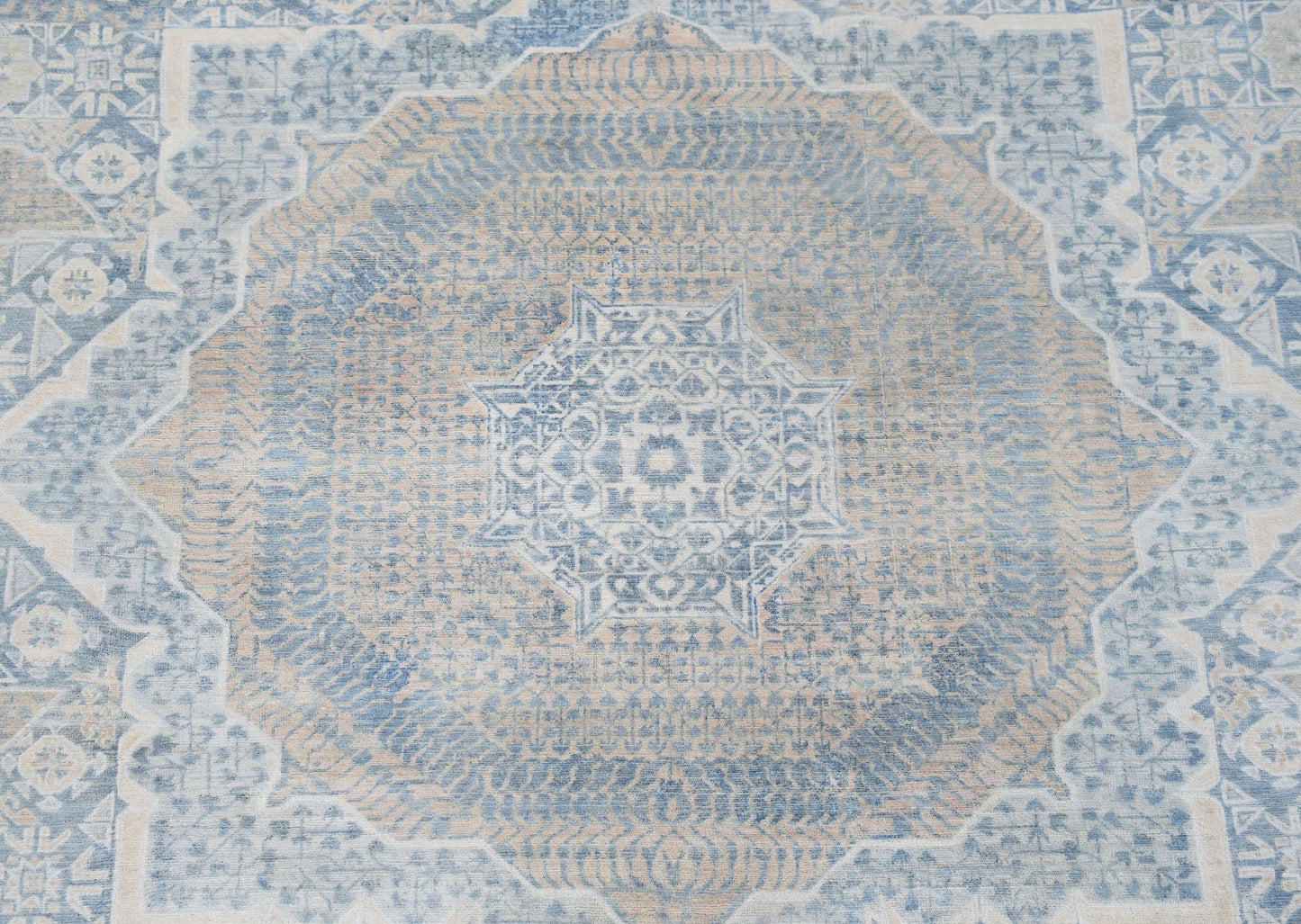 Handwoven Afghan Balkh rug featuring a detailed blue and beige Mamluk medallion pattern.
