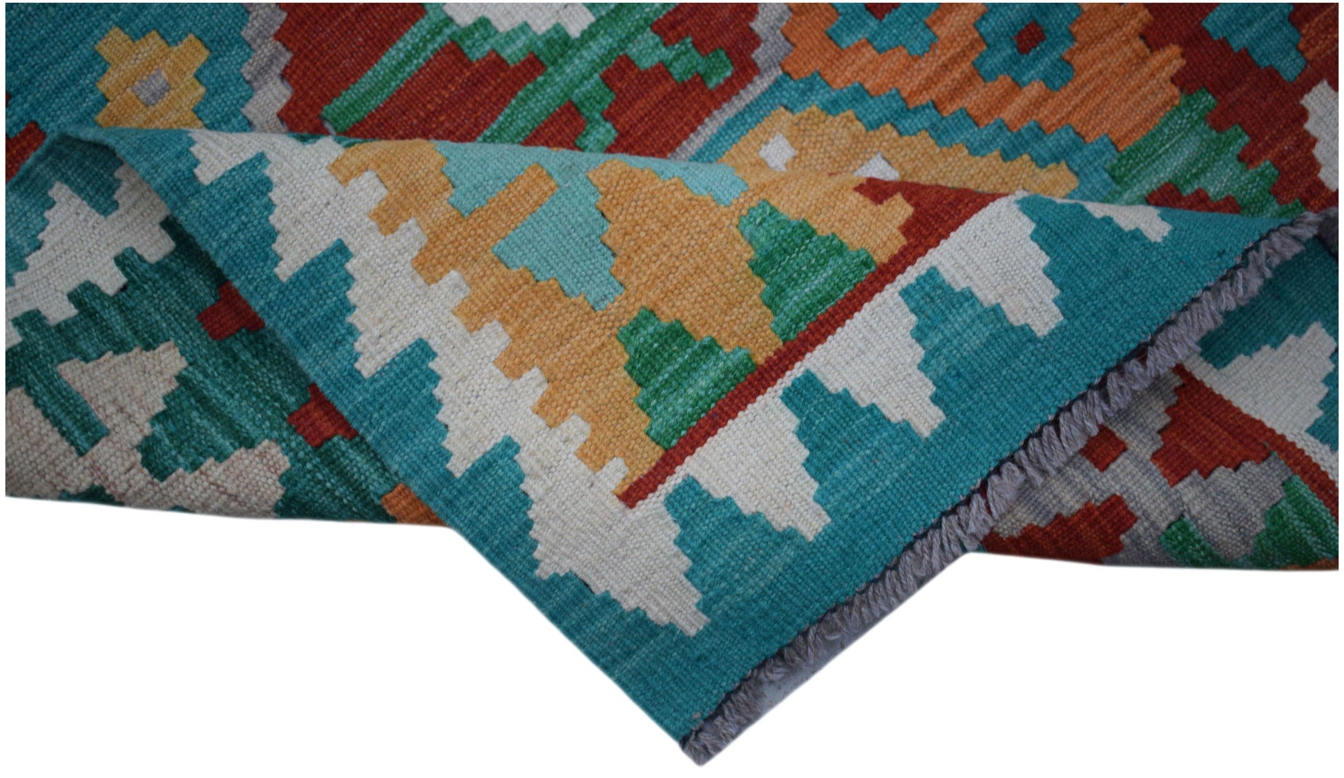 Handwoven Afghan Maimana kilim runner featuring a colorful geometric pattern in wool.