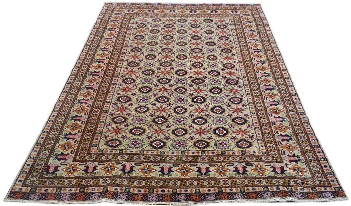 A hand-knotted Afghan Bashiri rug featuring a geometric pattern in silk and wool.