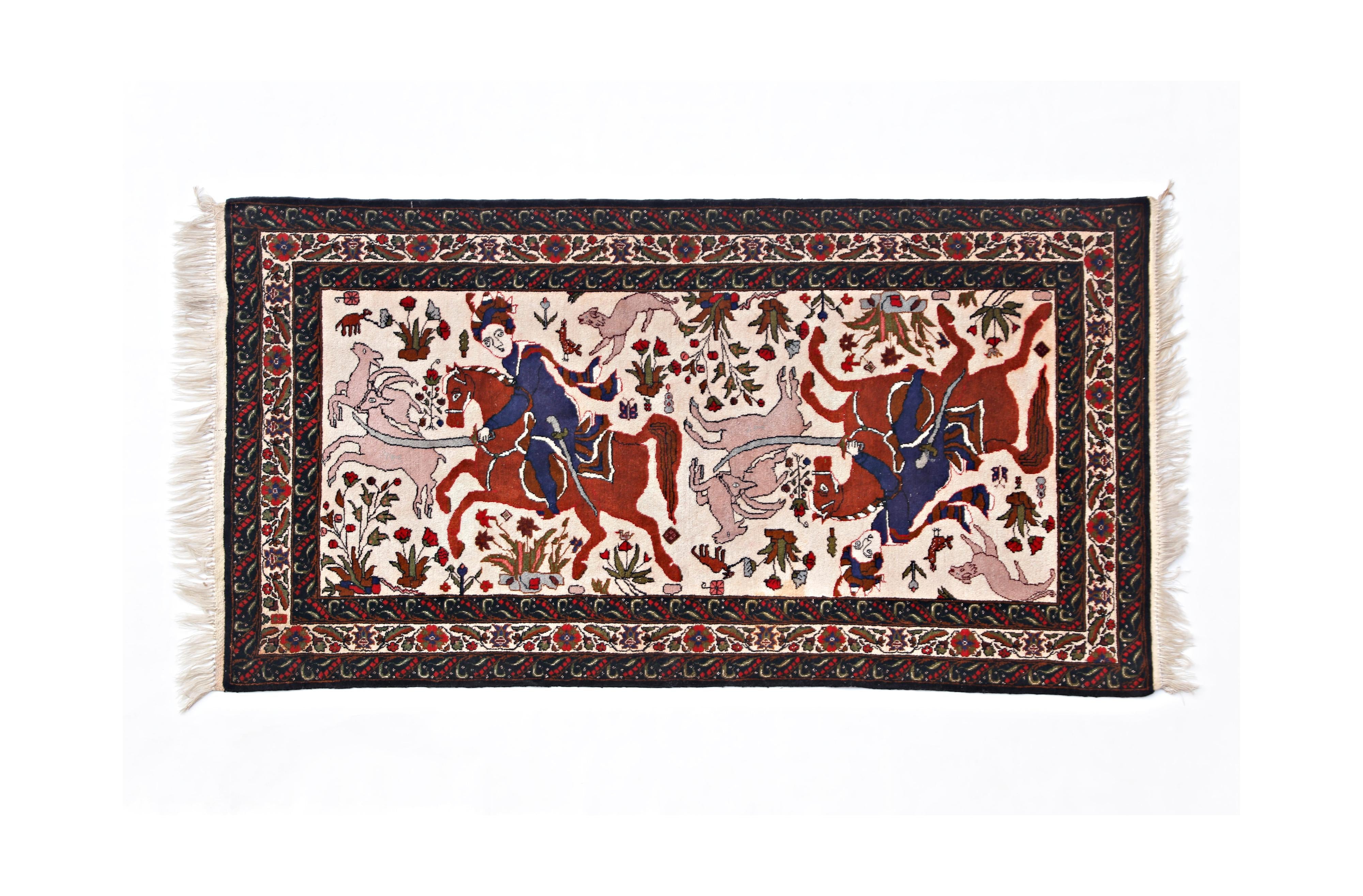 A vintage handmade Persian rug featuring a detailed hunting scene with riders on a cream background.
