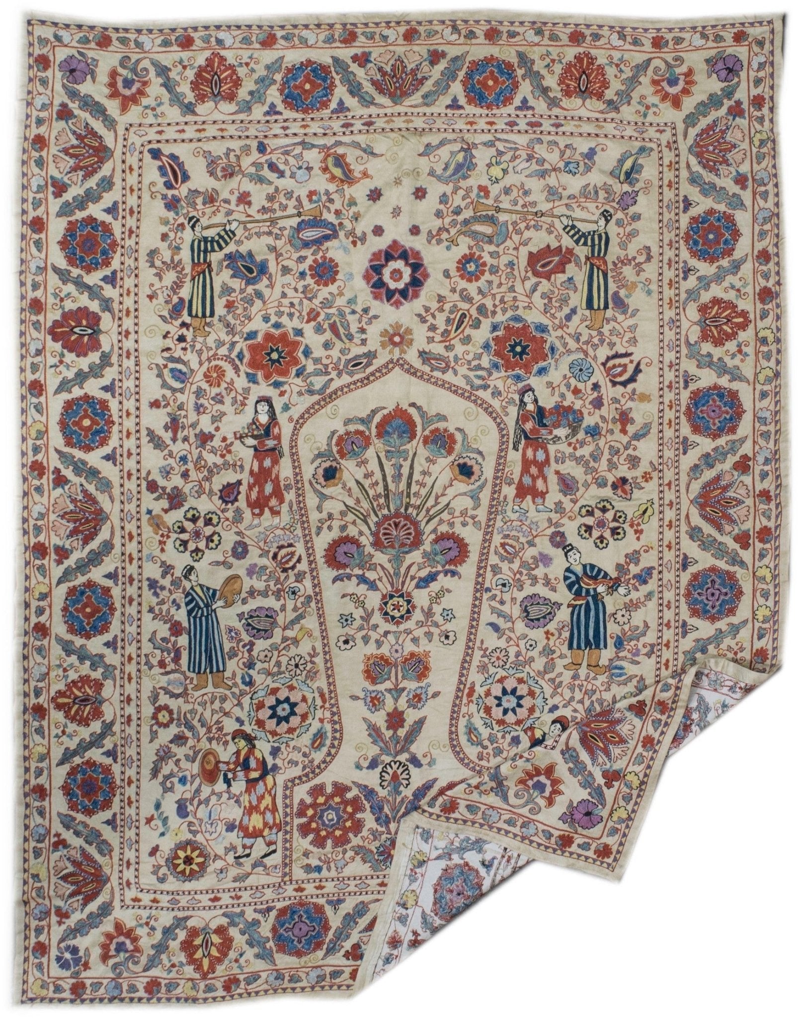 Handmade Uzbek suzani featuring intricate silk floral embroidery and figures on a cream silk base.