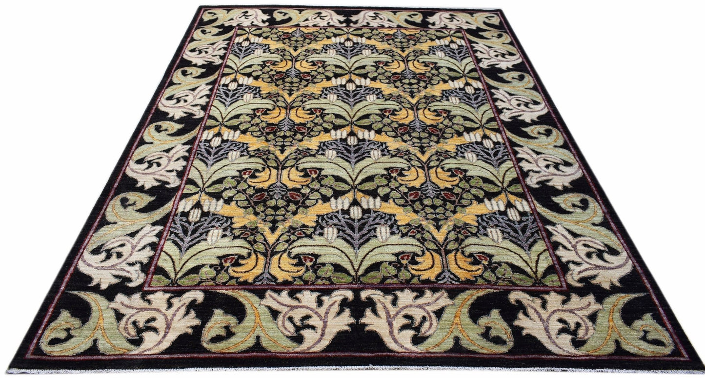 A handwoven Afghan wool rug featuring a black background with a repeating botanical floral pattern.