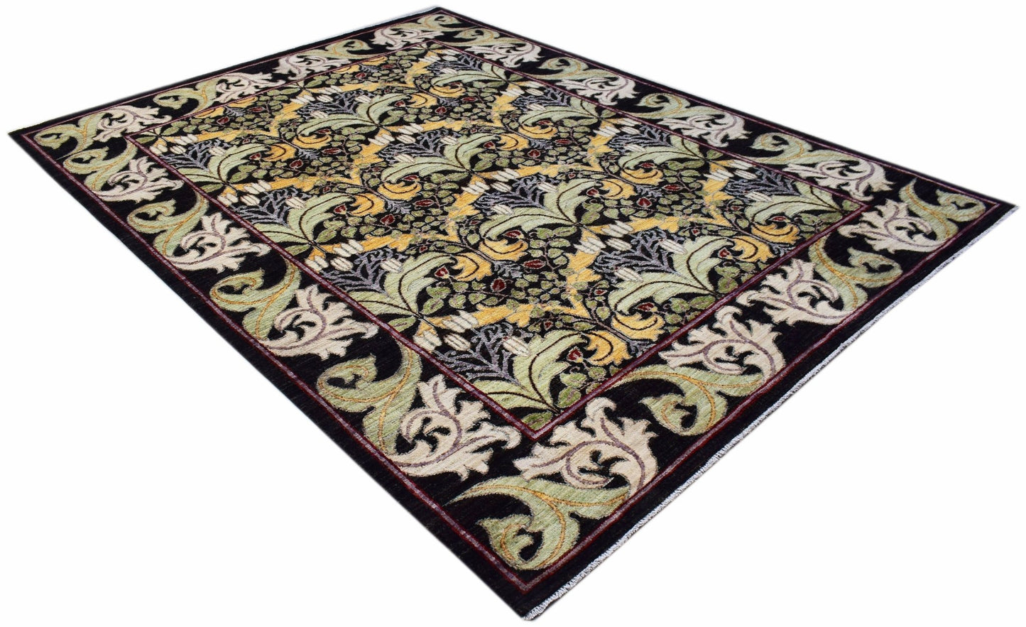 A rectangular handwoven Afghan rug featuring a botanical floral pattern in green, gold, and black.