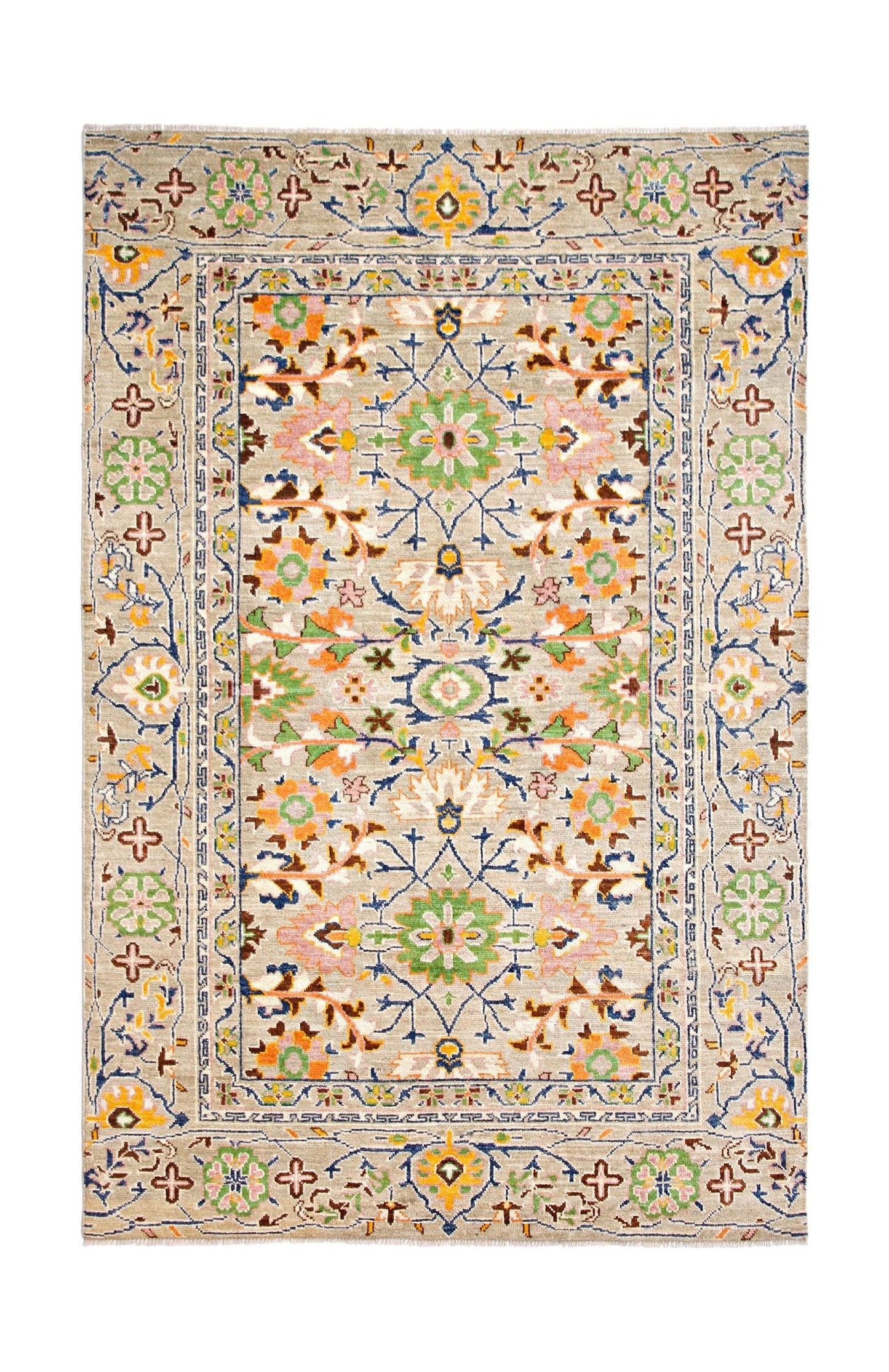 A handmade transitional wool rug from Afghanistan featuring a floral pattern in soft colors.