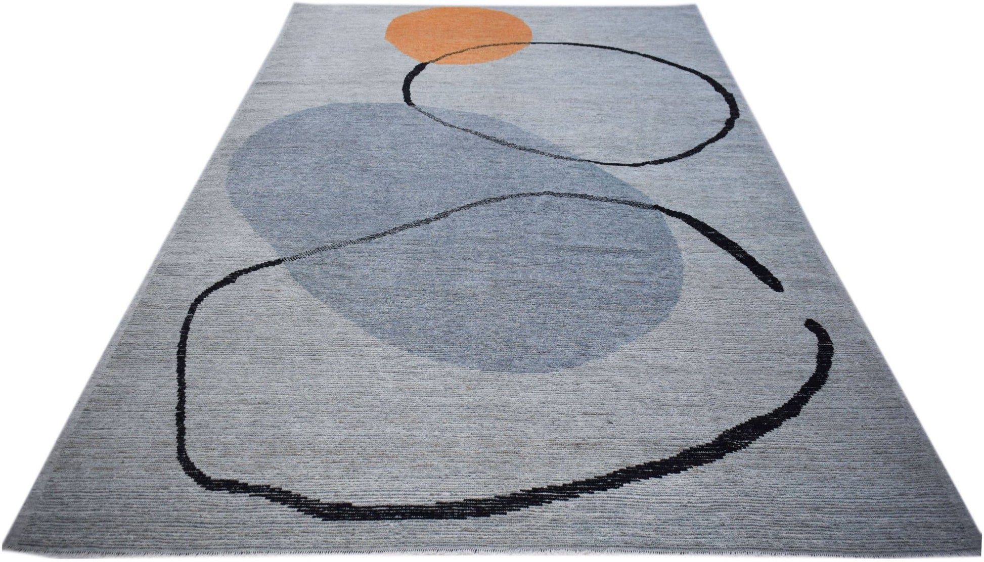 An Afghan Kohi rug featuring abstract black line art and blue shapes on a grey wool background.
