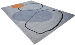 An Afghan Kohi rug featuring a grey background with abstract black lines and a circular orange accent.