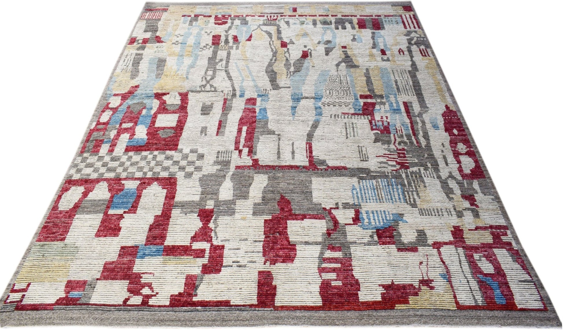 A hand-knotted Afghan rug featuring a geometric abstract pattern in red, blue, and grey tones.