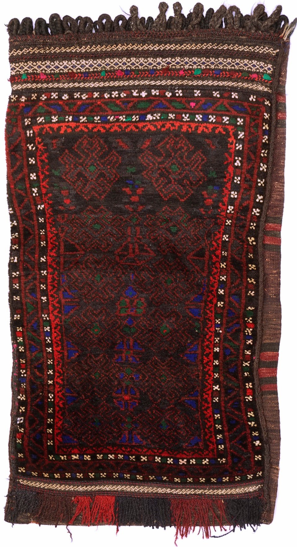 A handmade vintage Afghan Baluch wool cushion featuring intricate dark geometric tribal patterns.