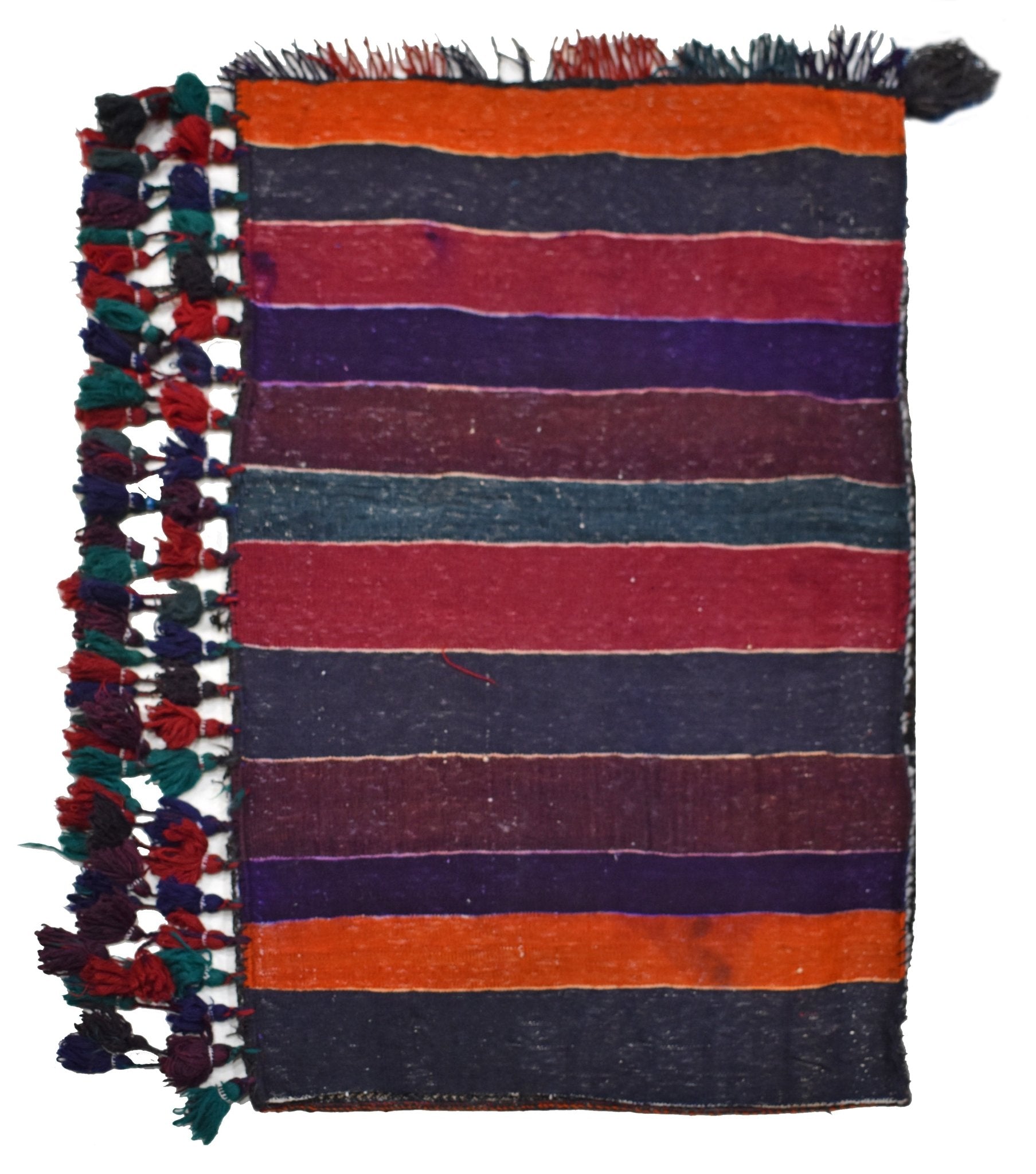 A vintage handmade Afghan wool cushion featuring horizontal stripes and decorative side tassels.