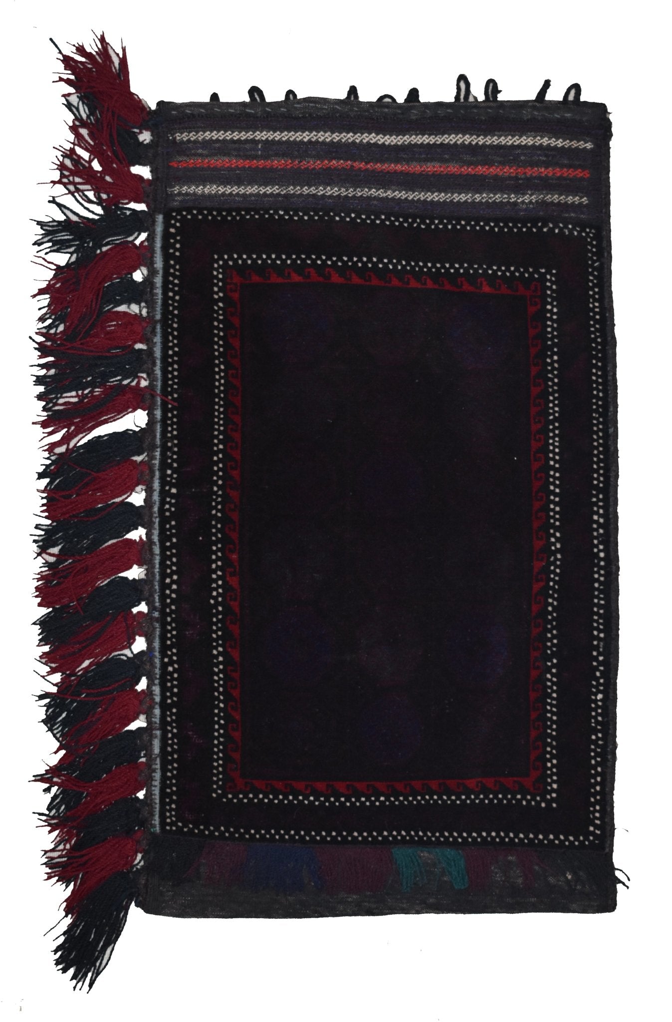 A vintage handmade Afghan Baluch wool cushion featuring a dark field with red geometric borders.
