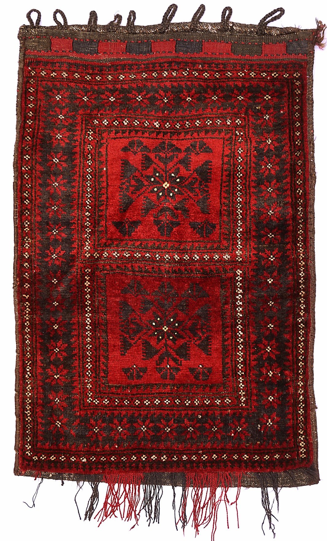 A handmade vintage Afghan Baluch wool cushion featuring a dark red and black geometric pattern.