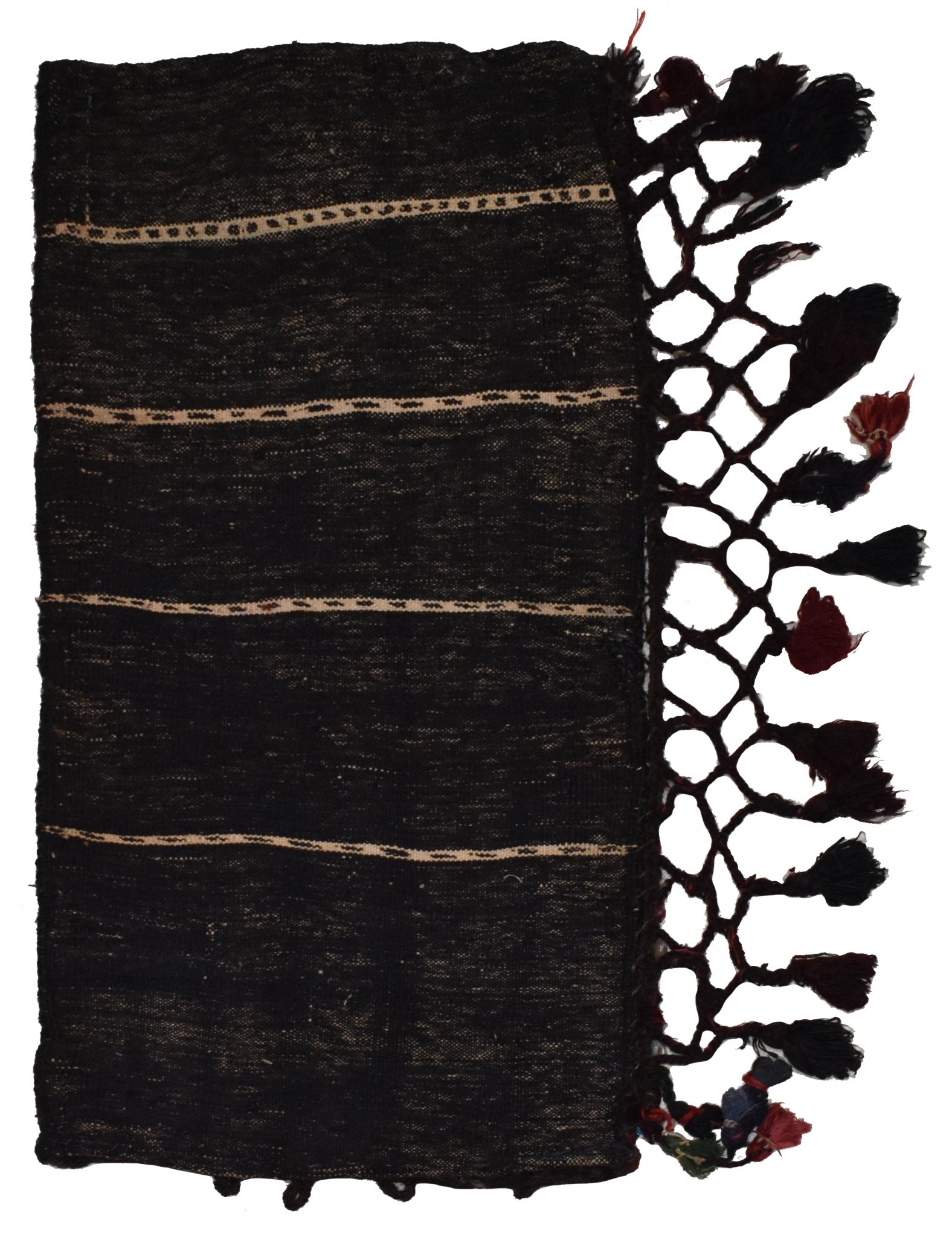A vintage Afghan Baluch cushion featuring a dark wool fabric with striped details and tassel trim.