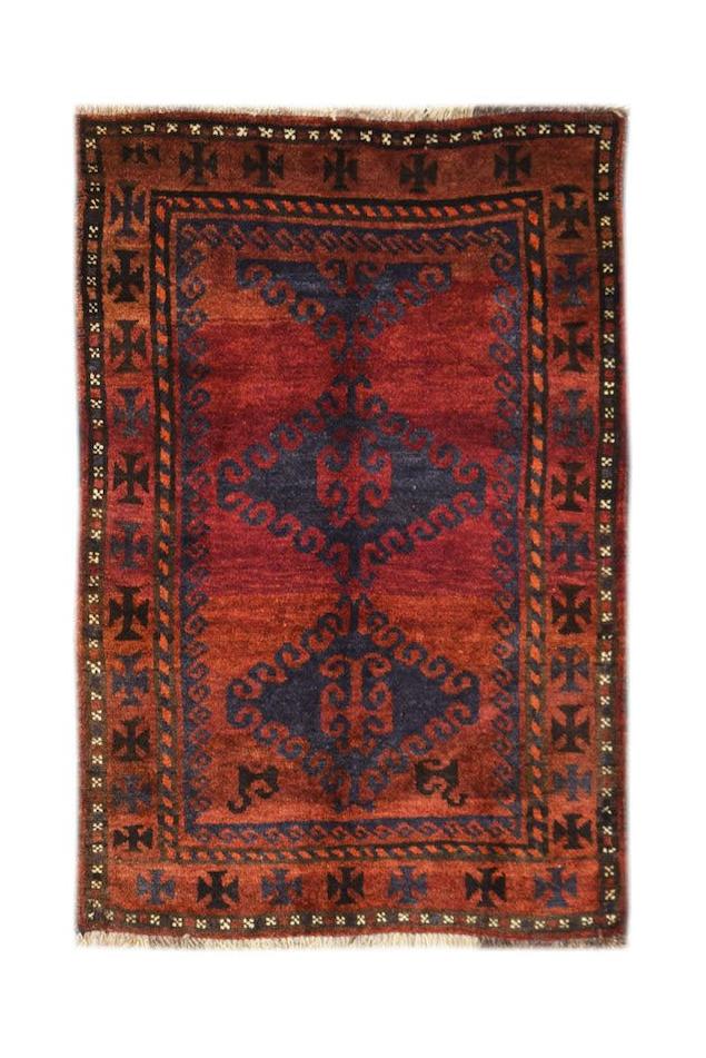 Vintage Afghan Baluch rug with red and blue geometric patterns.