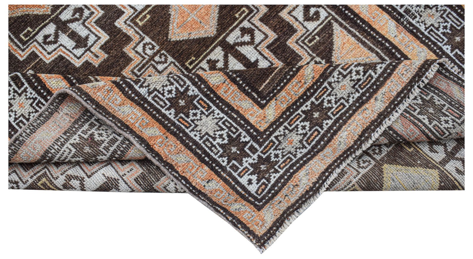 A handwoven vintage Afghan Baluch rug featuring geometric patterns in brown, orange, and cream.