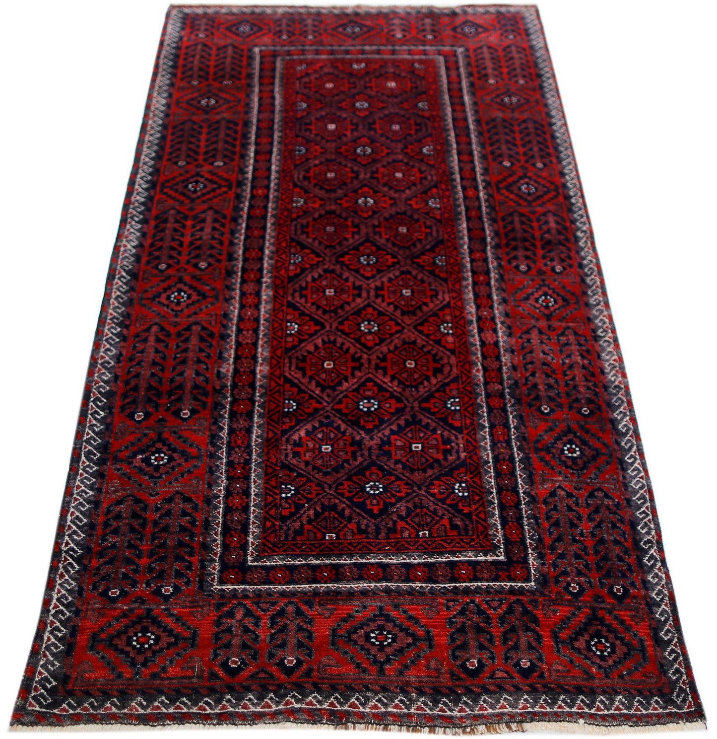 A handmade vintage Afghan Baluch rug featuring a geometric pattern in deep red and dark blue tones.