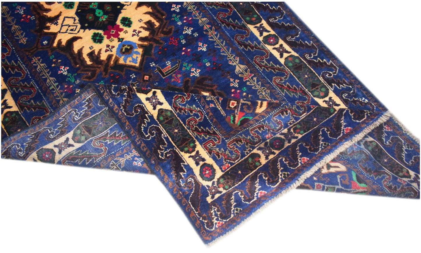 A vintage handmade Afghan Baluch rug featuring a deep blue field with intricate geometric patterns.