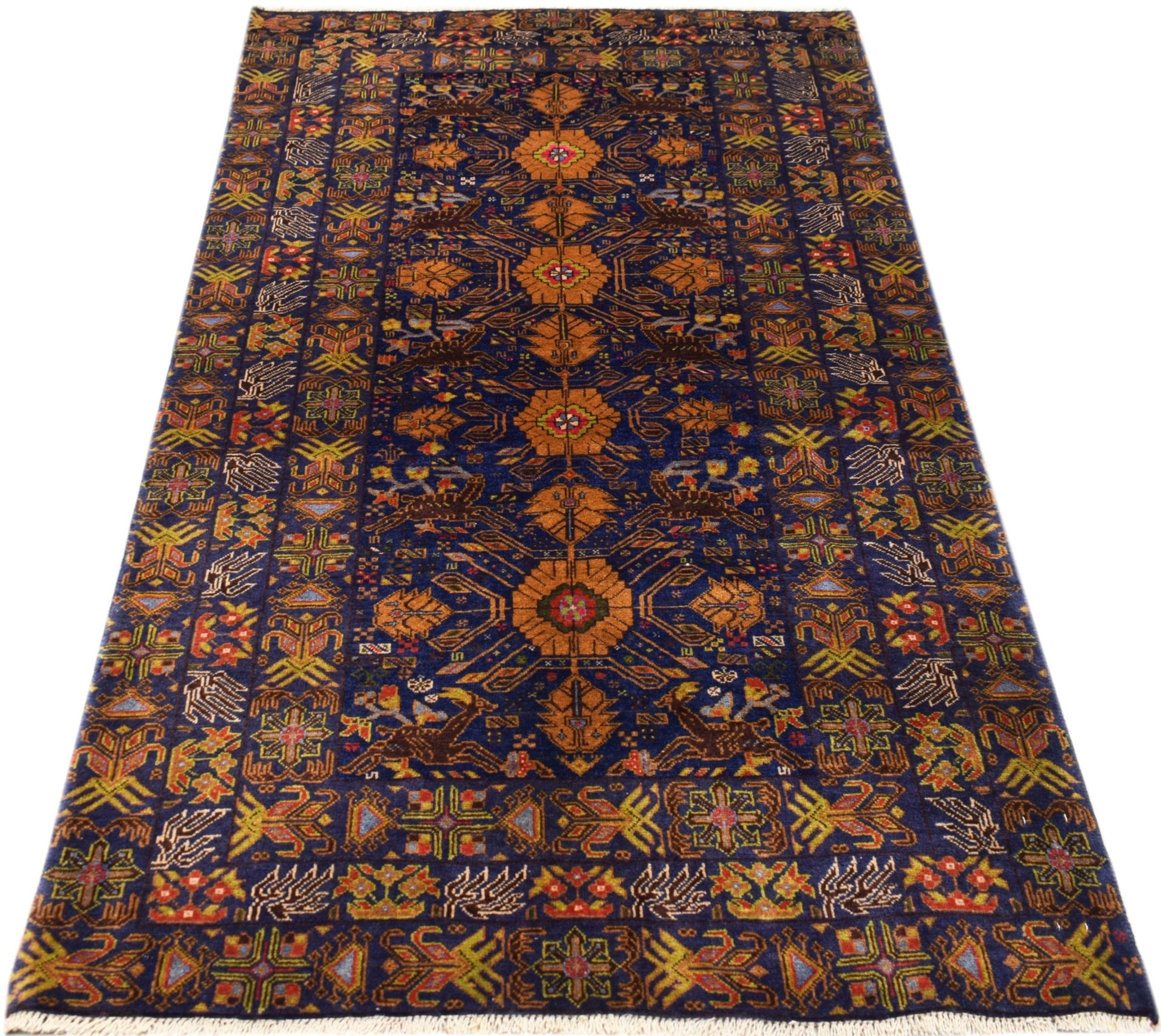 A rectangular vintage Afghan Baluch rug featuring intricate geometric patterns in orange and blue.