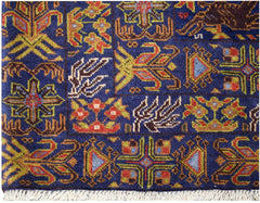 A vintage Afghan Baluch rug featuring a blue field with intricate geometric and floral patterns.