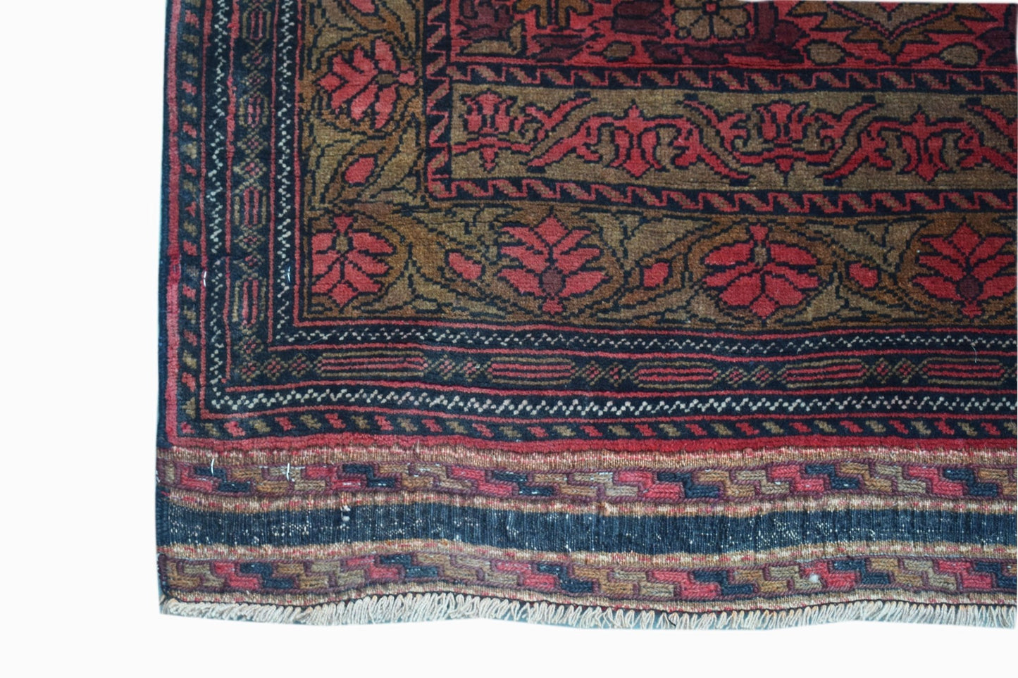 A hand-knotted vintage Afghan runner featuring a traditional Herati pattern in red and brown.
