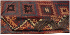 A vintage handmade Afghan Maimana kilim rug featuring geometric patterns in rich, warm tones.