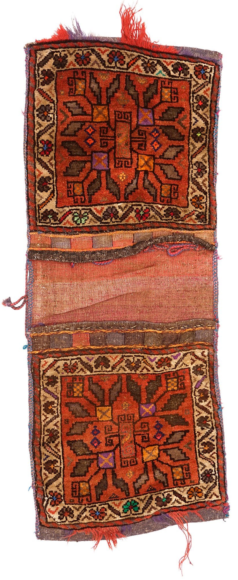 A vintage handmade Afghan wool saddle bag featuring two matching panels with geometric patterns.