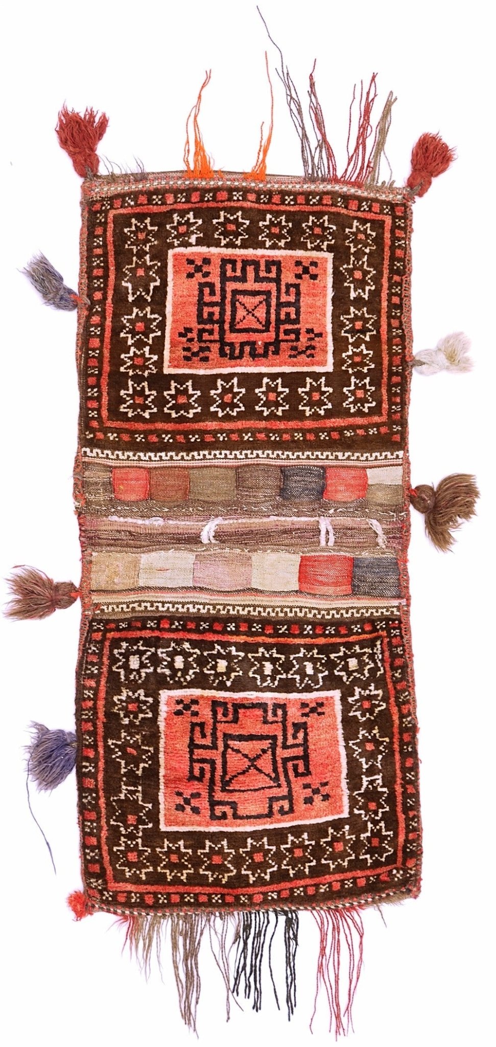 A handmade vintage Afghan wool saddle bag featuring two rectangular panels with geometric motifs.