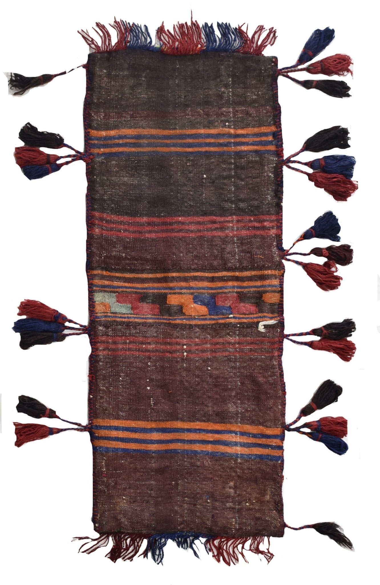 A handmade vintage Afghan wool saddle bag featuring dark brown stripes and colorful tassels.