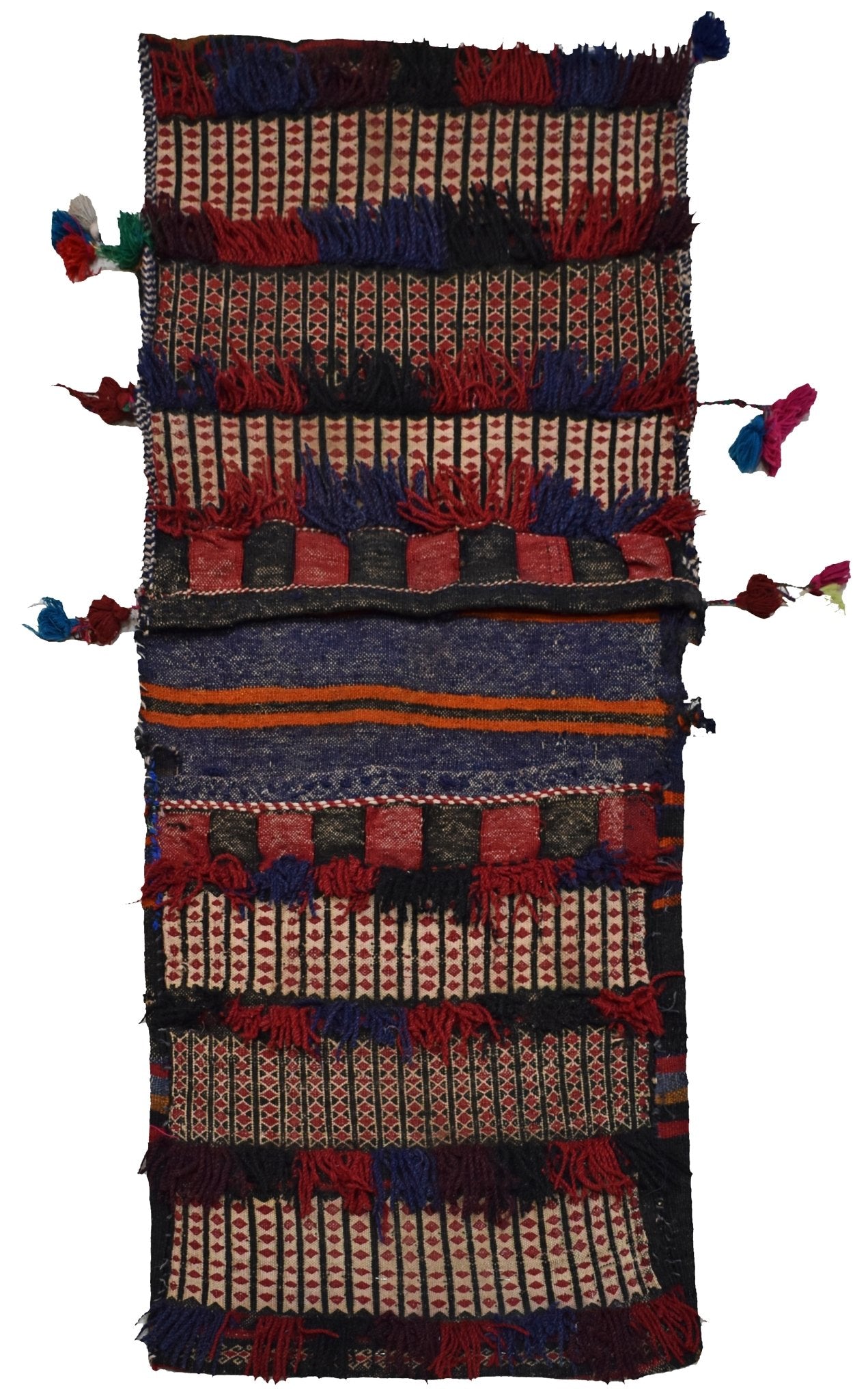 A vintage handmade Afghan wool saddle bag featuring geometric patterns and decorative tassels.