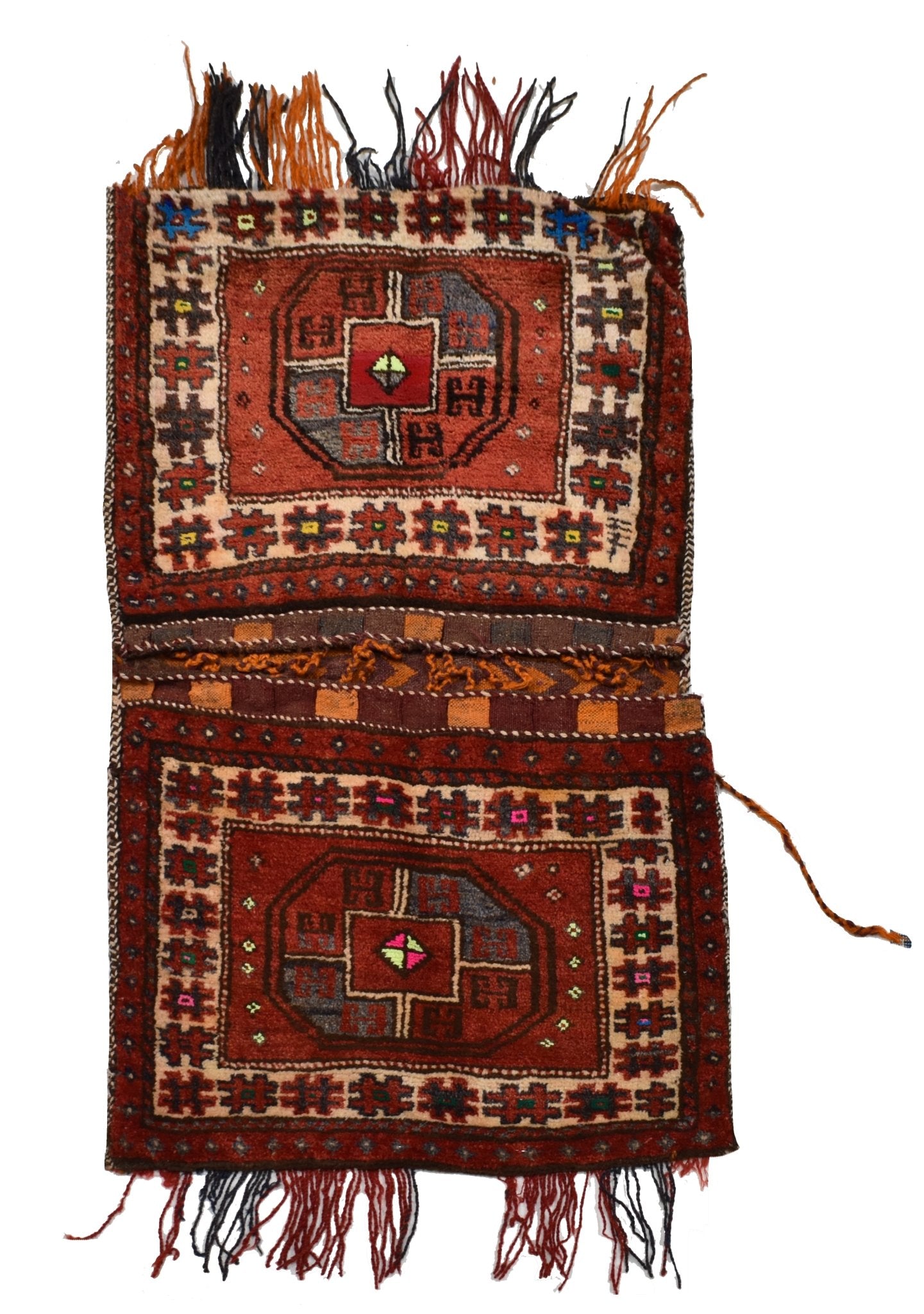 A vintage handmade Afghan wool saddle bag featuring two matching panels with geometric motifs.