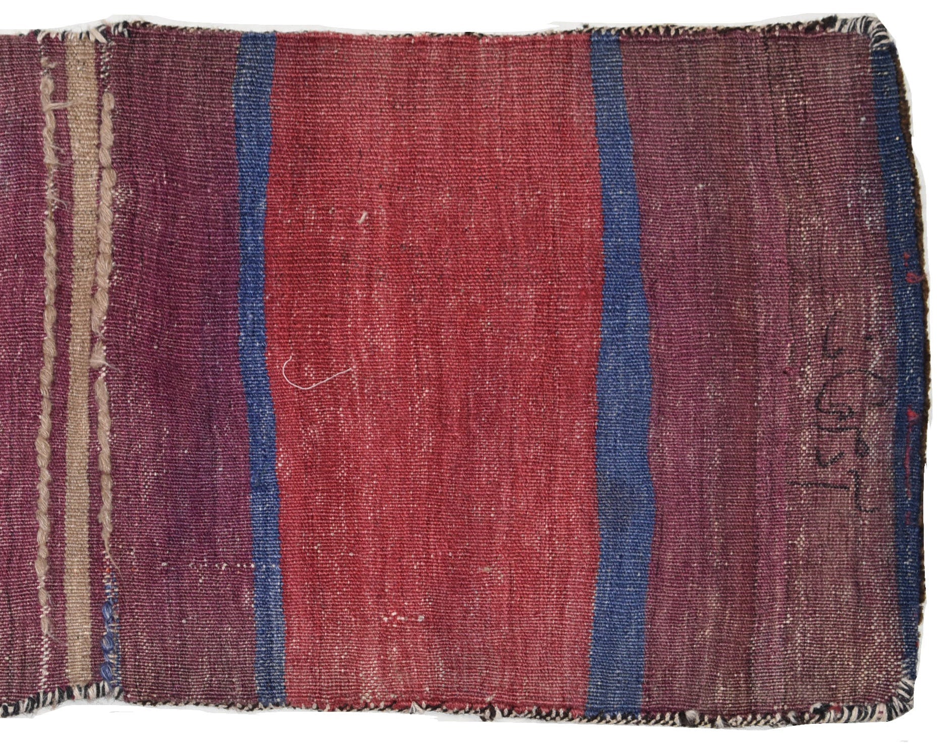 A vintage handmade Afghan wool saddle bag featuring vertical stripes in red, blue, and purple.