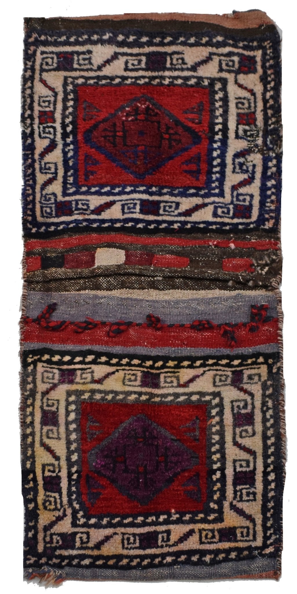 A vintage handmade Afghan wool saddle bag featuring two square panels with geometric diamond motifs.