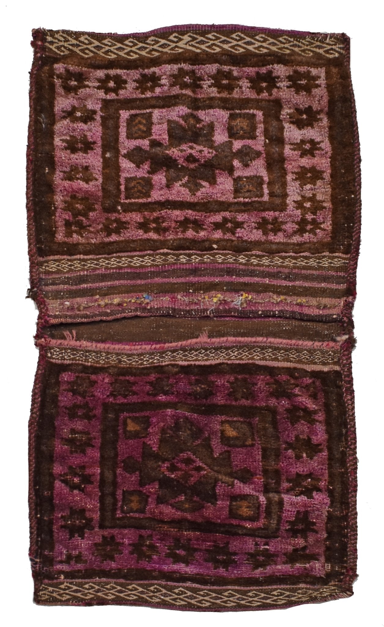A vintage handmade Afghan wool saddle bag featuring two matching panels with geometric patterns.