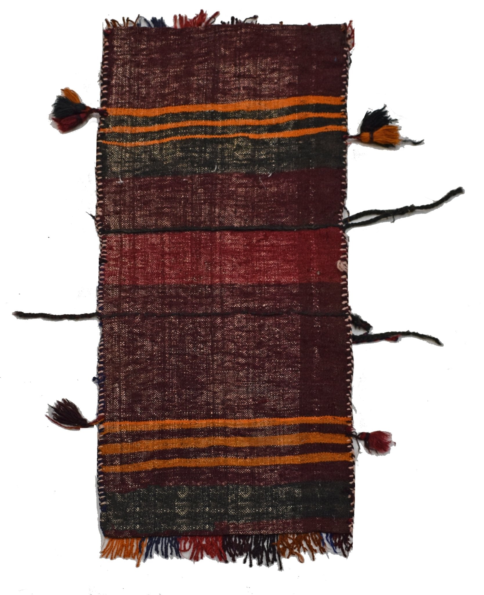 A vintage handmade Afghan wool saddle bag featuring horizontal stripes and decorative tassels.