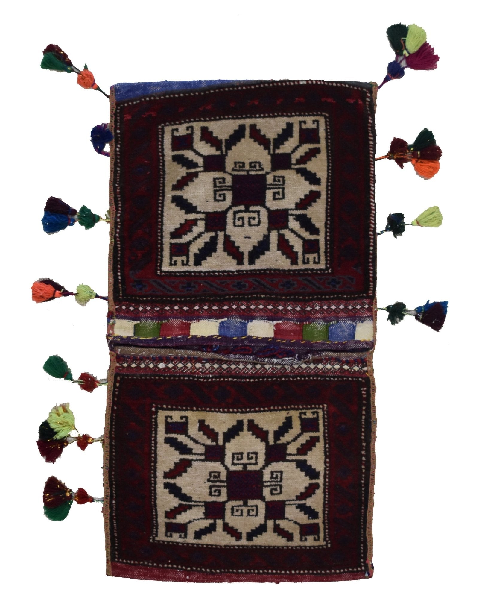 A handmade vintage Afghan wool saddle bag featuring two square panels with geometric motifs.