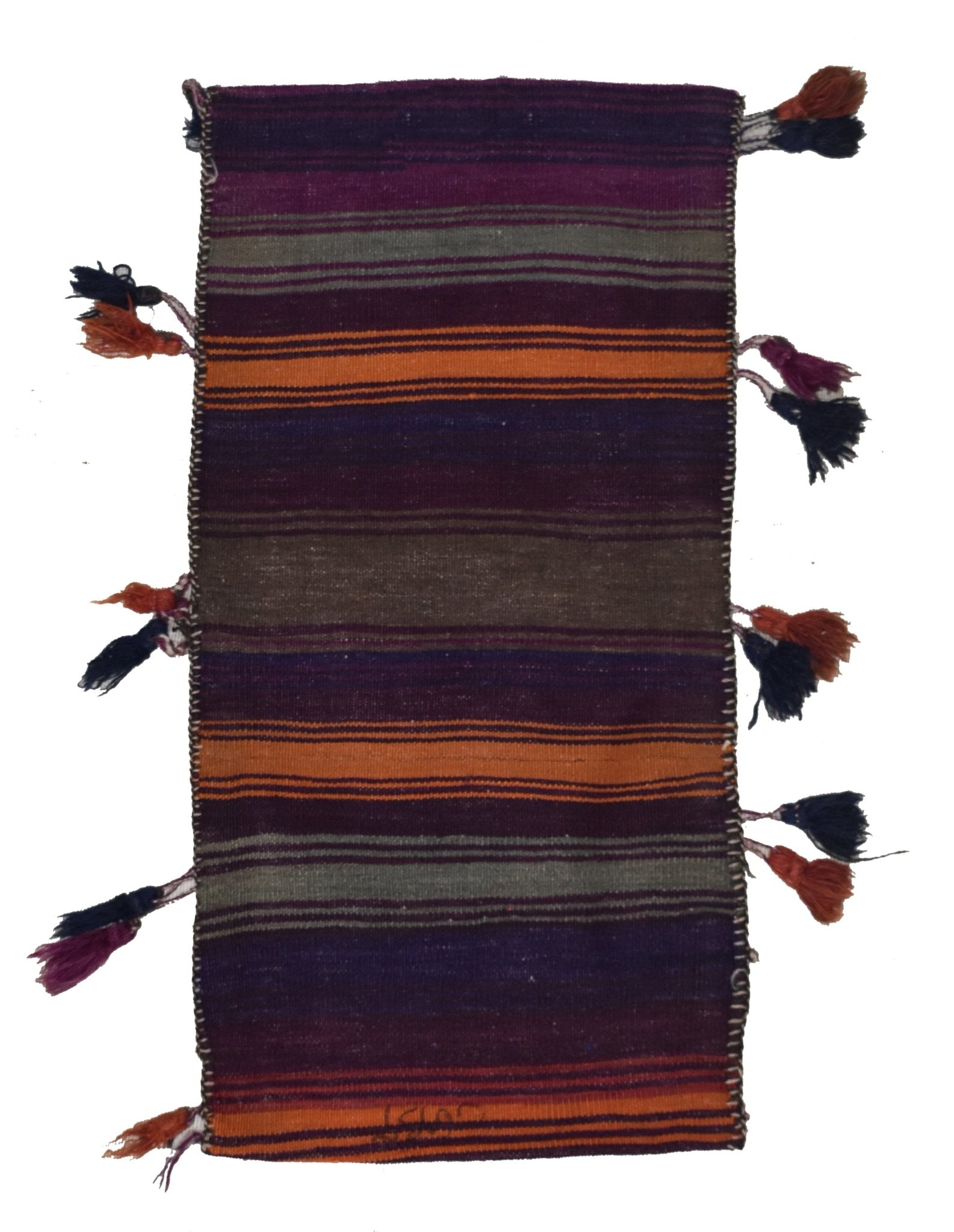 A vintage handmade Afghan wool saddle bag featuring horizontal stripes and decorative tassels.