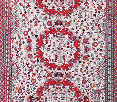 A vintage Afghan Sumak kilim featuring intricate red and white geometric floral patterns.