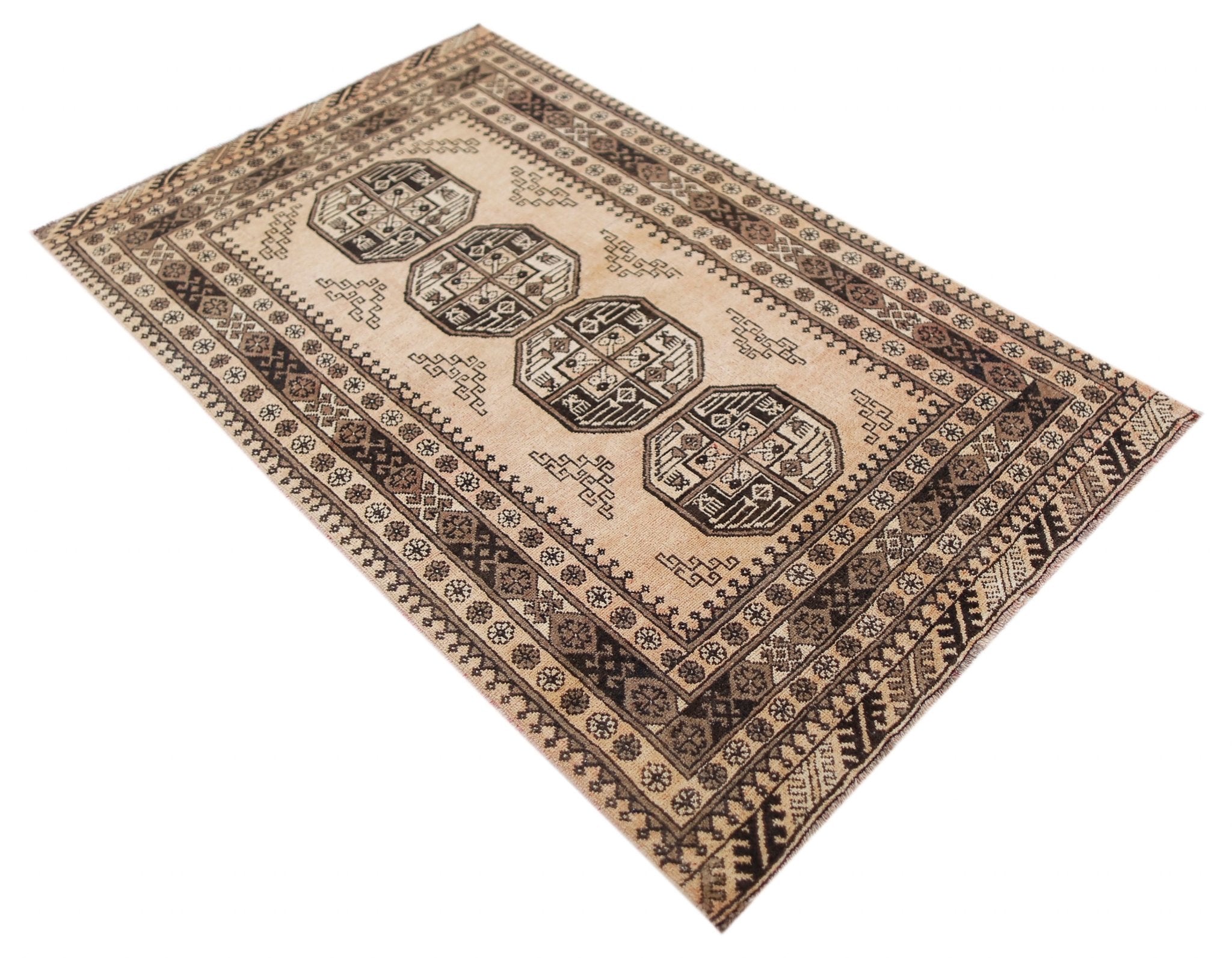 A vintage Afghan Turkmen rug featuring four geometric medallions on a natural wool background.