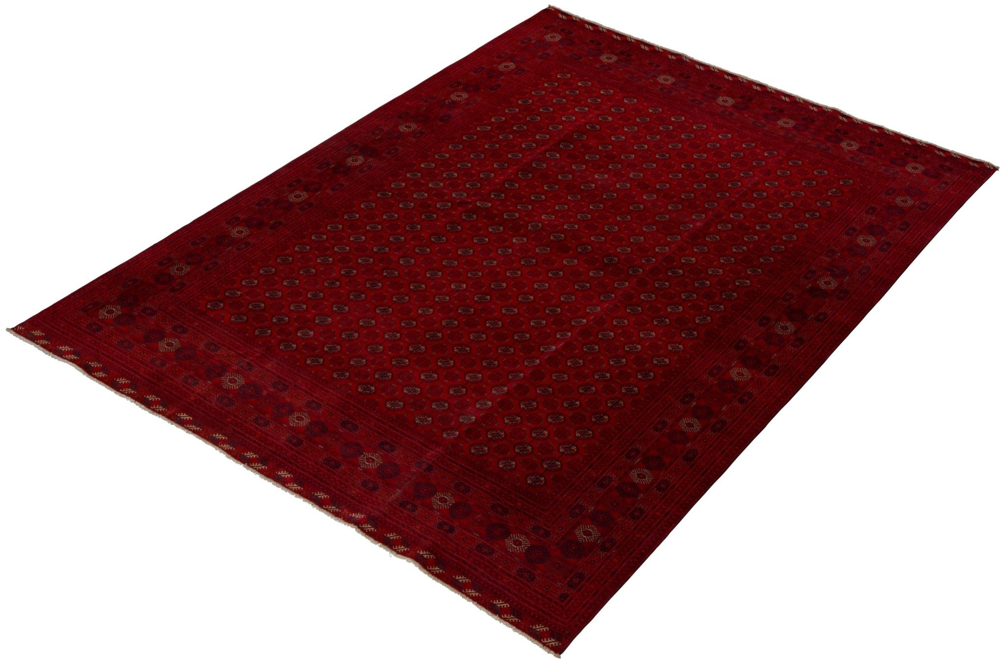 A vintage handmade Afghan Turkmen rug featuring a deep red field with repeating geometric motifs.