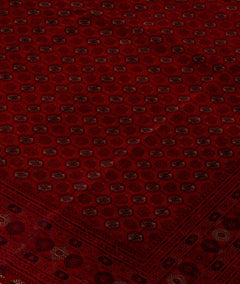 Vintage Afghan Turkmen rug with a red field and geometric patterns.