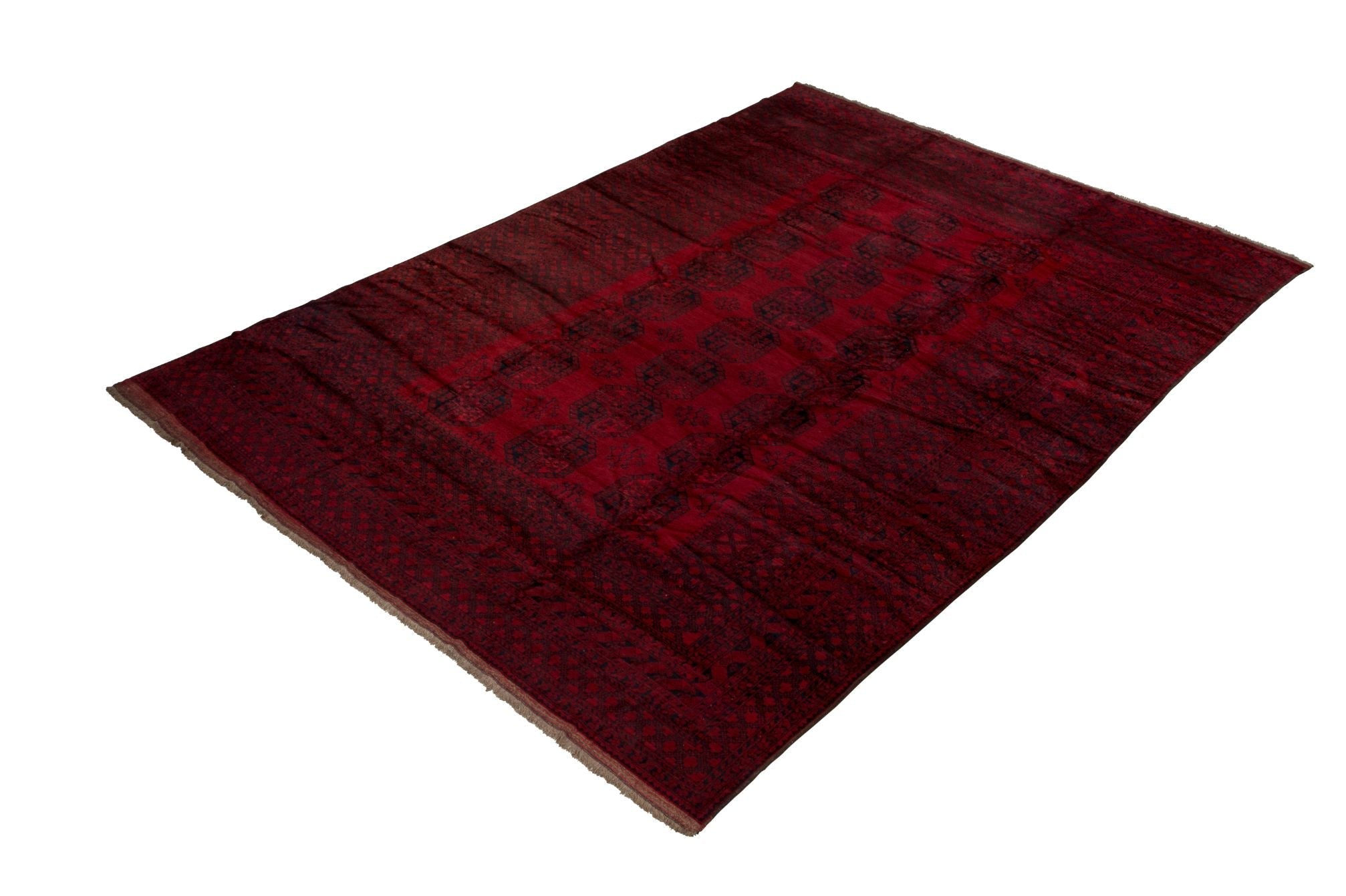 A rectangular handmade vintage Afghan Turkmen rug featuring a deep red field with geometric motifs.