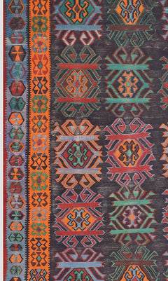 A vintage Caucasian Karabagh kilim featuring geometric tribal patterns in vibrant wool colors.