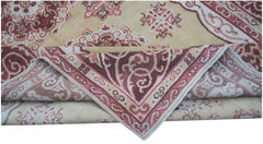 A vintage Chinese Khotan rug featuring a floral medallion pattern in shades of red and beige.
