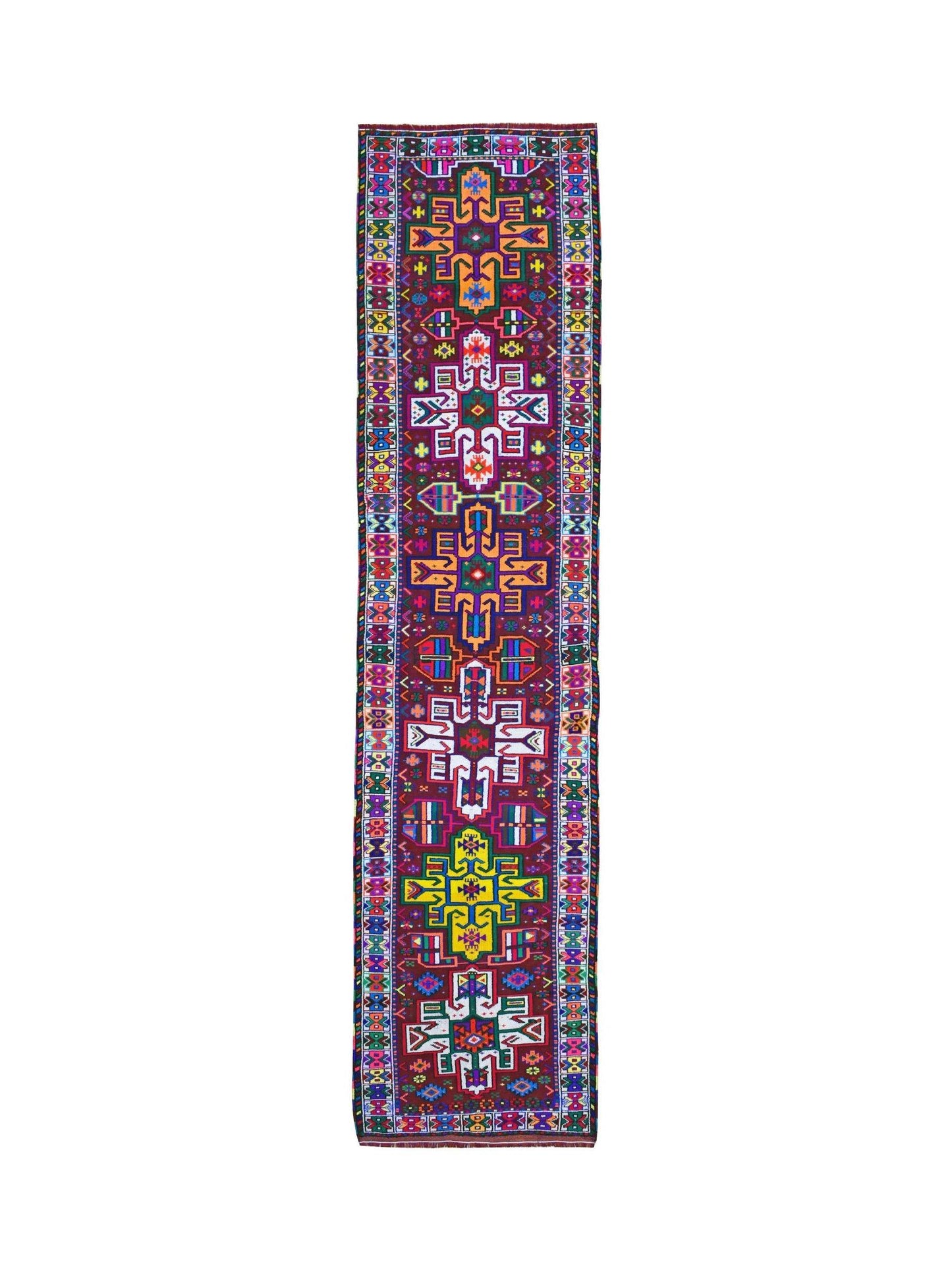 A vintage Kurdish Herki runner featuring vibrant tribal motifs on a dark wool background.