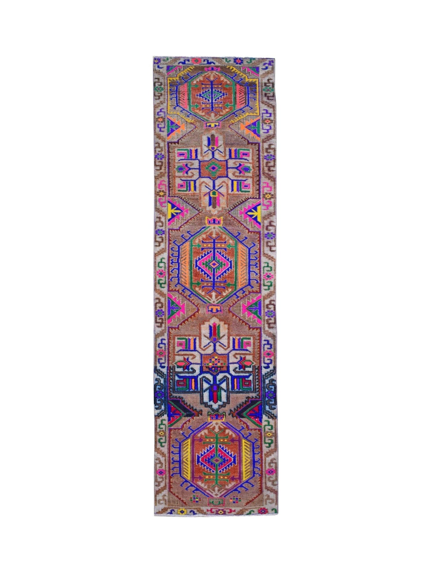 A vintage Kurdish Herki runner featuring vibrant tribal motifs on a brown wool base.