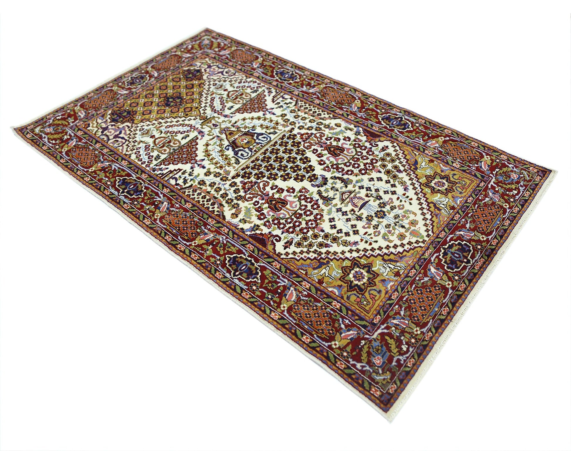 A vintage handmade Pakistani wool rug featuring an intricate floral pattern in red, cream, and gold.