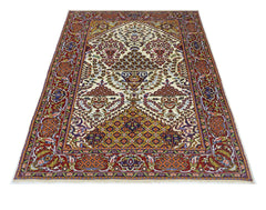 A rectangular vintage Pakistani rug featuring a traditional floral pattern in red and cream tones.