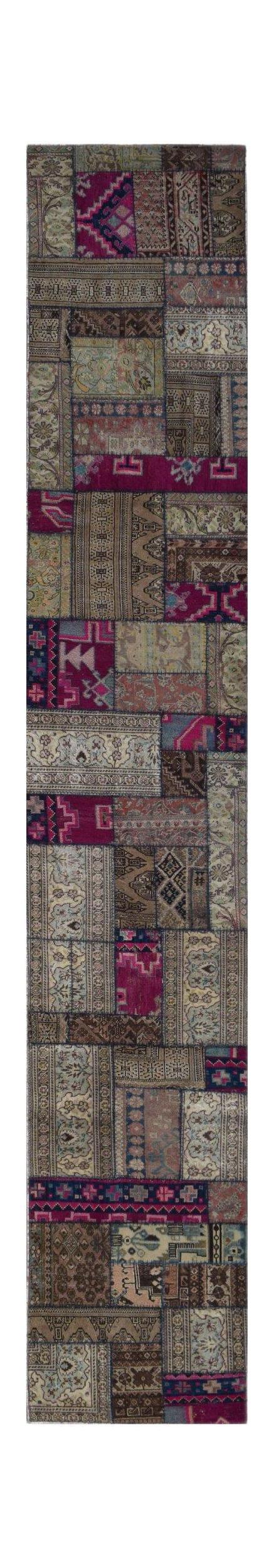 A handmade vintage patchwork runner rug featuring a variety of colorful wool patterns.