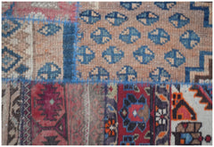 A handmade vintage patchwork runner featuring a variety of colorful wool rug fragments.